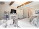 Luxurious primary bedroom with a fireplace and access to the ensuite bathroom at 4165 Milford Trl, Cumming, GA 30028