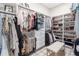 Large walk-in closet with ample shelving and hanging space at 4165 Milford Trl, Cumming, GA 30028