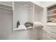 Large walk-in closet with double hanging rods and shelving at 4165 Milford Trl, Cumming, GA 30028