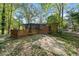 Backyard with screened porch and concrete patio at 5051 Heather Se Rd, Smyrna, GA 30082