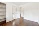Empty bedroom with hardwood floors, white walls, and a closet at 5051 Heather Se Rd, Smyrna, GA 30082
