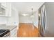 View from the kitchen into the adjacent dining room, showcasing the open floor plan at 5051 Heather Se Rd, Smyrna, GA 30082