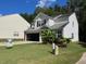 Two-story house with attached garage at 345 Meadows Ln, Canton, GA 30114