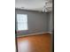 Bedroom with wood-look flooring and ceiling fan at 345 Meadows Ln, Canton, GA 30114