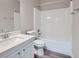 Clean bathroom with white vanity, tub shower combo, and gray floor at 3306 Summer Brooke Ln, Union City, GA 30291