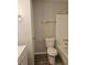 Clean bathroom with tub, toilet, and vanity at 255 Bellwood Ln, Riverdale, GA 30274