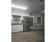 Kitchen with stainless steel appliances and access to backyard at 255 Bellwood Ln, Riverdale, GA 30274