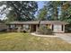 Brick ranch home with well-manicured lawn at 255 Bellwood Ln, Riverdale, GA 30274