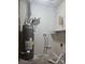 Laundry room with water heater and shelving at 255 Bellwood Ln, Riverdale, GA 30274