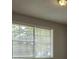 Window with blinds, allowing for natural light at 255 Bellwood Ln, Riverdale, GA 30274