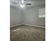 Spacious bedroom with carpet and ceiling fan at 255 Bellwood Ln, Riverdale, GA 30274