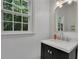 Modern bathroom with quartz countertop and updated fixtures at 3126 Crestmont Nw Way, Kennesaw, GA 30152