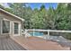 Deck overlooks the kidney shaped pool and backyard at 3126 Crestmont Nw Way, Kennesaw, GA 30152