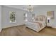 Comfortable bedroom with hardwood floors and plenty of natural light at 3126 Crestmont Nw Way, Kennesaw, GA 30152