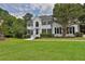 Two-story white brick house with black shutters at 3126 Crestmont Nw Way, Kennesaw, GA 30152