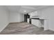 Basement kitchenette with white cabinets and vinyl flooring at 3126 Crestmont Nw Way, Kennesaw, GA 30152