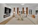 Open living room with comfortable seating, large windows, and a modern electric fireplace at 3126 Crestmont Nw Way, Kennesaw, GA 30152