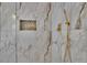 Modern shower with marble tile and geometric accent at 3126 Crestmont Nw Way, Kennesaw, GA 30152