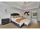 Spacious main bedroom with ensuite bathroom and access to a private patio at 3126 Crestmont Nw Way, Kennesaw, GA 30152