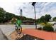 Lime bike parked near shops and restaurants at 392 Pratt Se Dr # 2012, Atlanta, GA 30315