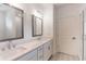 Bathroom with double vanity, quartz countertop, and access to shower at 392 Pratt Se Dr # 2012, Atlanta, GA 30315