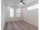 Bright bedroom with carpet, ceiling fan, and large windows at 392 Pratt Se Dr # 2012, Atlanta, GA 30315