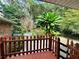 Deck overlooking a lush, wooded backyard at 6441 Dunmoor Dr, Jonesboro, GA 30236