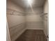 Spacious walk-in closet with ample shelving and hanging space at 328 Willow Cv, Canton, GA 30114