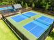 Four well-lit pickleball courts for recreation at 328 Willow Cv, Canton, GA 30114