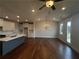 Bright dining room with hardwood floors and a chandelier at 328 Willow Cv, Canton, GA 30114