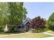 Community clubhouse with welcoming porch and landscaping at 328 Willow Cv, Canton, GA 30114