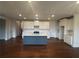 Modern kitchen with a large island and white cabinets at 328 Willow Cv, Canton, GA 30114