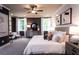 Spacious main bedroom with cozy seating area and large windows at 119 Henley St, Canton, GA 30114