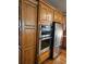 Kitchen with stainless steel appliances and wood cabinets at 1175 Bowerie Chase, Powder Springs, GA 30127