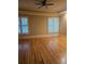 Bright bedroom with hardwood floors and plantation shutters at 1175 Bowerie Chase, Powder Springs, GA 30127