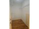 Walk-in closet with wire shelving and hardwood floors at 1175 Bowerie Chase, Powder Springs, GA 30127