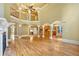 Open concept living room with hardwood floors and high ceilings at 1175 Bowerie Chase, Powder Springs, GA 30127