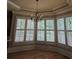 Bright dining area with hardwood floors and large windows at 1175 Bowerie Chase, Powder Springs, GA 30127