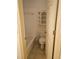 Simple bathroom with a tub, toilet and tile flooring at 1175 Bowerie Chase, Powder Springs, GA 30127