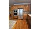 Kitchen with stainless steel appliances and wood cabinets at 1175 Bowerie Chase, Powder Springs, GA 30127