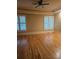 Spacious bedroom with hardwood floors and plantation shutters at 1175 Bowerie Chase, Powder Springs, GA 30127