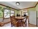 Dining area with hardwood floors and a wooden table at 2377 Centerville Rosebud Rd, Loganville, GA 30052