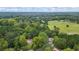 High-angle view of house and surrounding landscape at 115 Wilkins Rd, Fayetteville, GA 30214