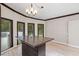 Bright dining area with hardwood floors and large windows at 115 Wilkins Rd, Fayetteville, GA 30214
