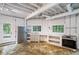Basement kitchenette with stainless steel appliances at 115 Wilkins Rd, Fayetteville, GA 30214