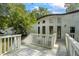 White deck with railings, offering access to the house at 115 Wilkins Rd, Fayetteville, GA 30214