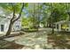 Long driveway leading to the house, surrounded by trees at 115 Wilkins Rd, Fayetteville, GA 30214