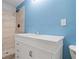 Clean bathroom with white vanity and tile shower at 115 Wilkins Rd, Fayetteville, GA 30214