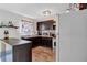Kitchen features stainless steel refrigerator and dark brown cabinetry at 2225 Pleasant Hill Rd, Atlanta, GA 30349