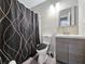 Clean bathroom with shower/tub combo and modern vanity at 2225 Pleasant Hill Rd, Atlanta, GA 30349